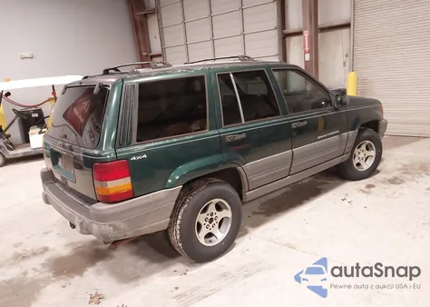 1997 Jeep Grand Cherokee Laredo/Tsi из США, поврежденный, VIN 1J4GZ58S9VC575673